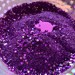 DALL·E 2023-05-22 09.50.39 - purple food for pig with glitter